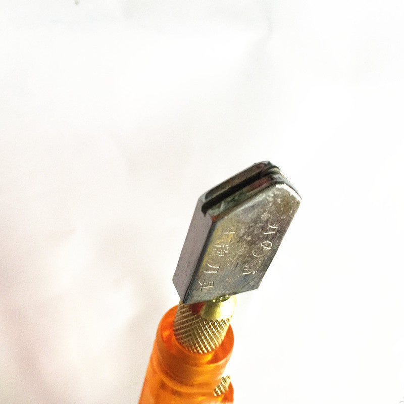 Cutting ceramic tiles with glass tools